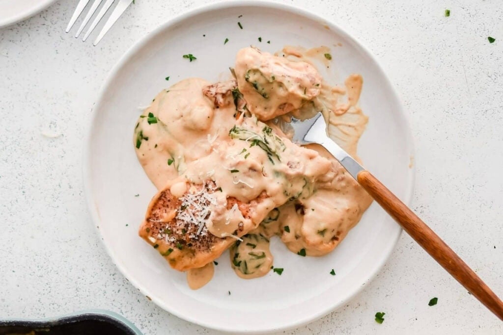 Marry me salmon on a plate.