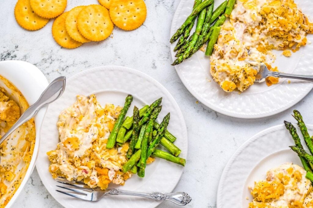 Poppy seed chicken casserole on a plates.