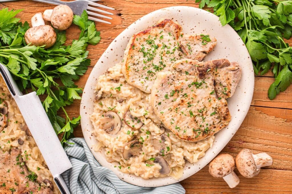 Pork chop casserole on a plate.