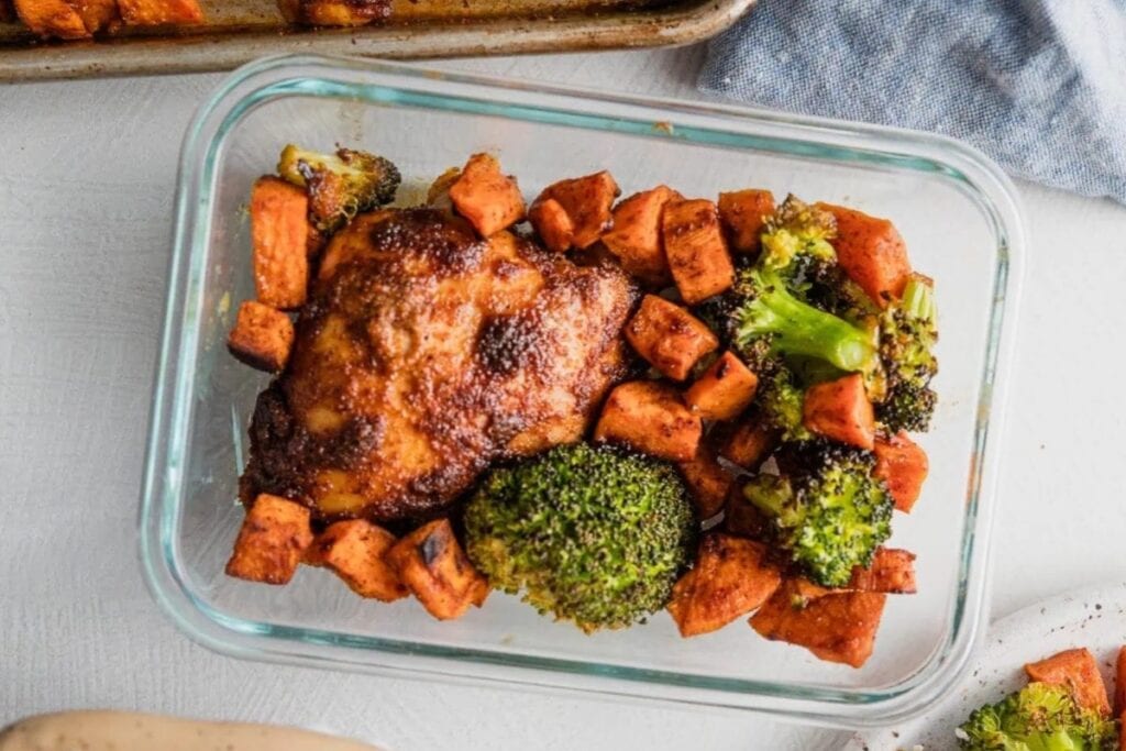 Chipotle chicken with sweet potatoes and broccoli baked in a dish.