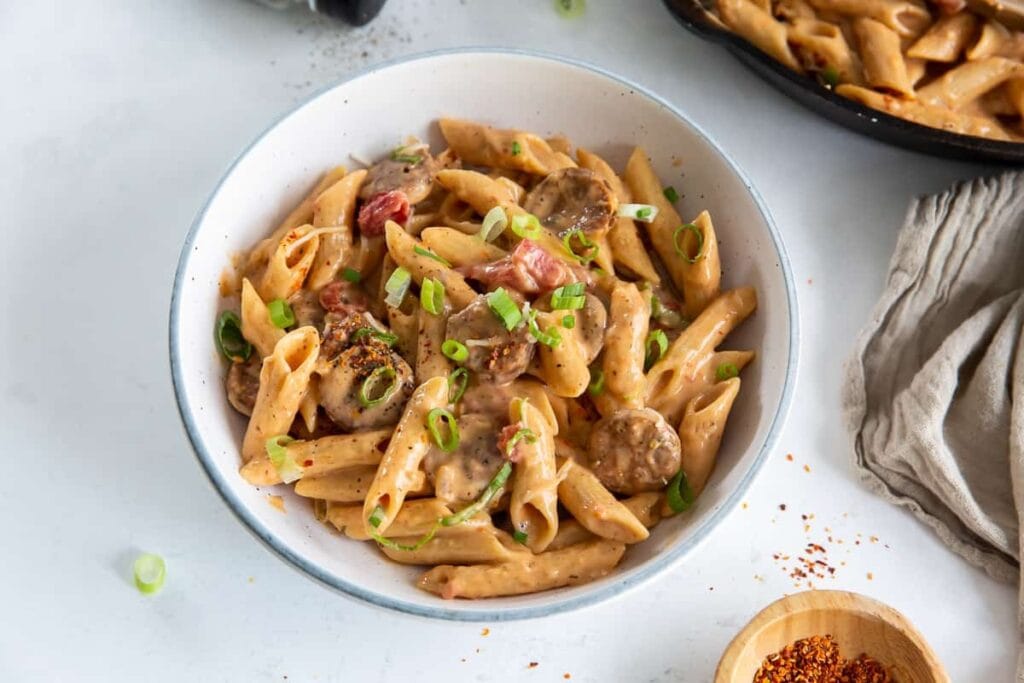 Skillet sausage pasta served in a bowl.