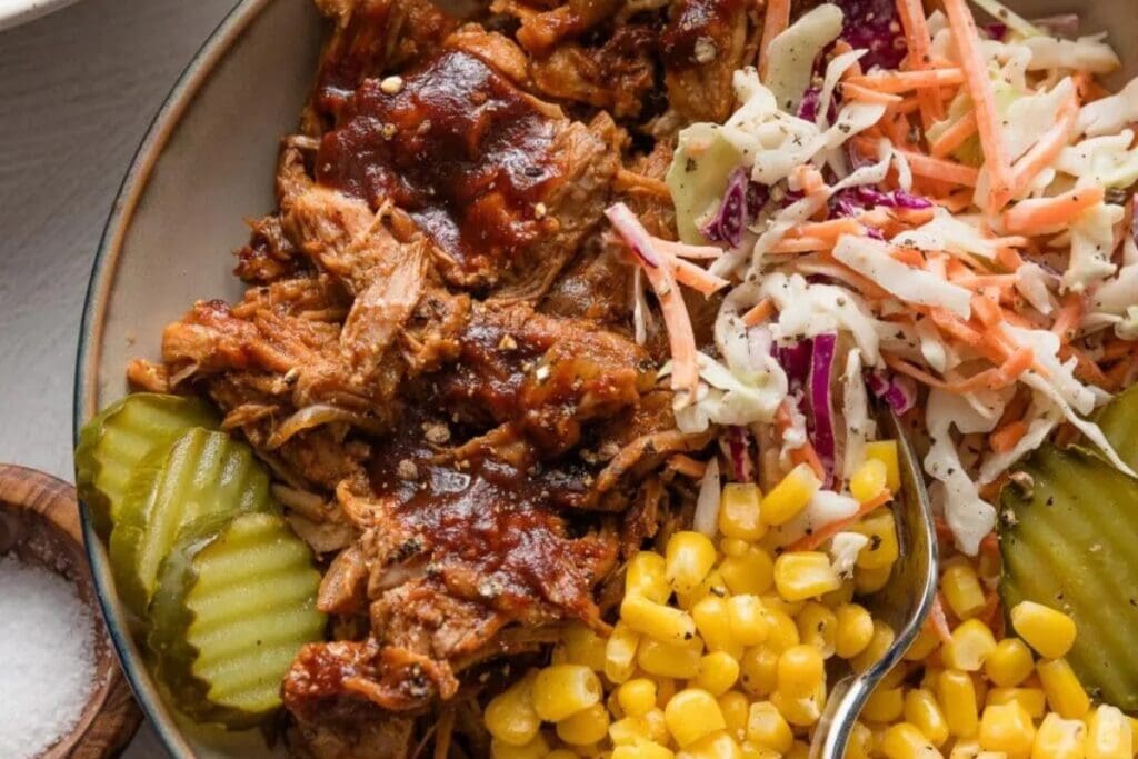 Slow cooker pulled pork on a plate.