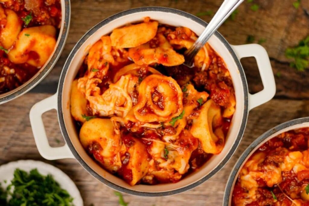 A close up shot of cheesy tortellini.