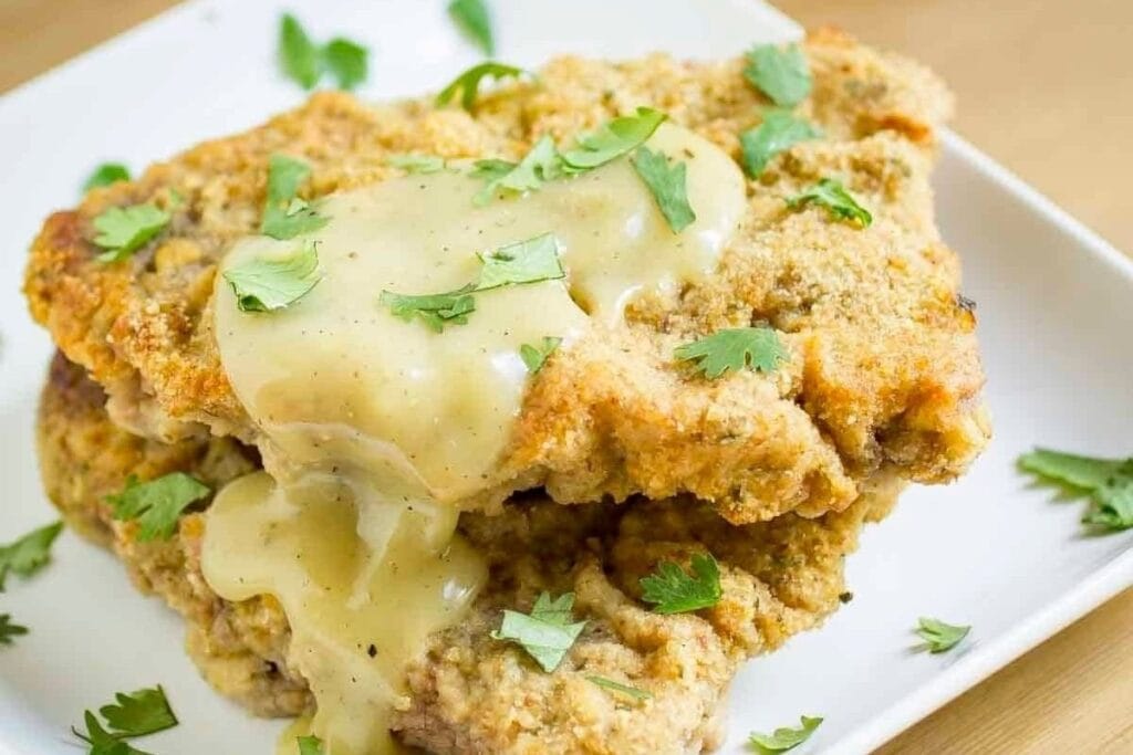 A close up shot of chicken cutlets.