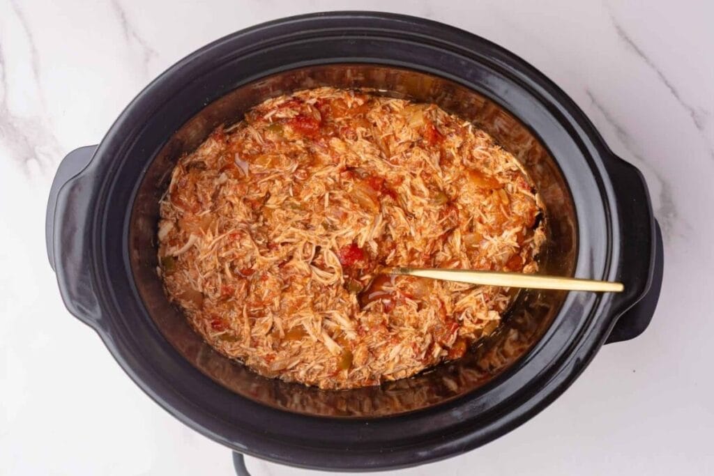 A close up shot of crockpot salsa chicken.
