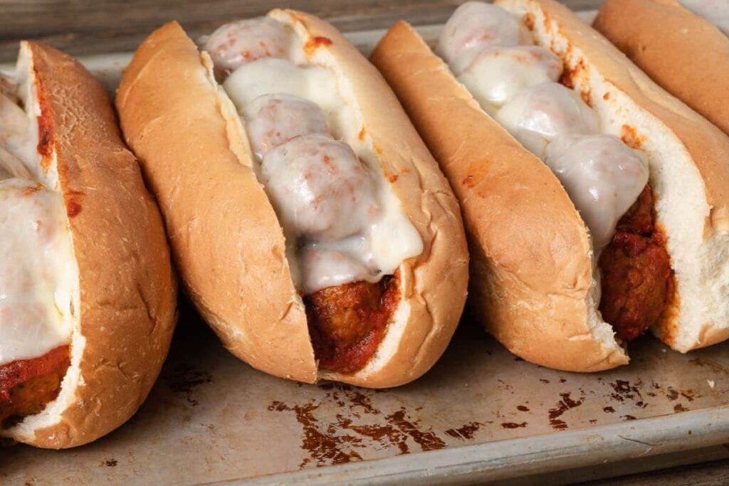 A close up shot of meatball sub sandwich.
