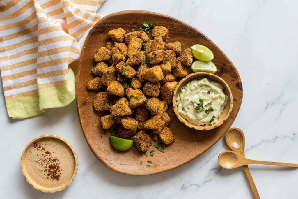 Air fryer crispy tofu on a plate.