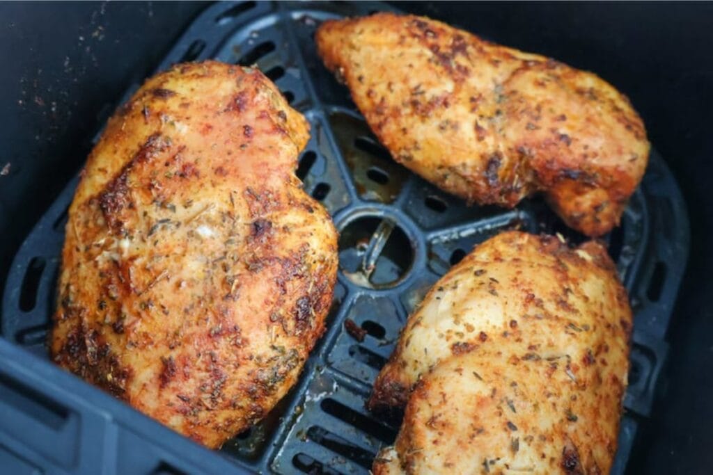 Juicy grilled chicken cooked in the air fryer.