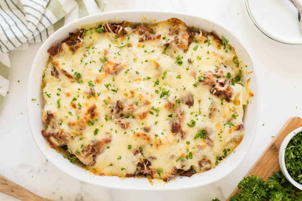 Bacon ranch potatoes in a baking dish.