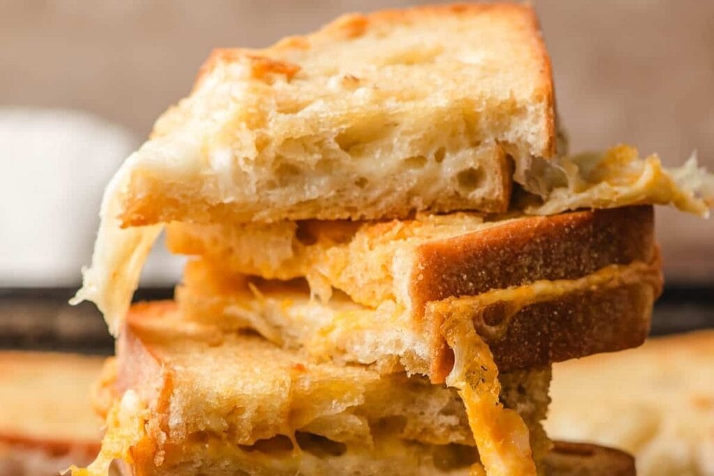 Close-up of baked grilled cheese sandwich.