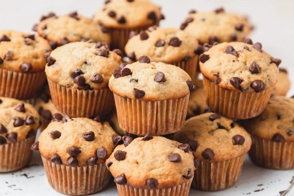 Banana chocolate chip mini muffins on a plate.
