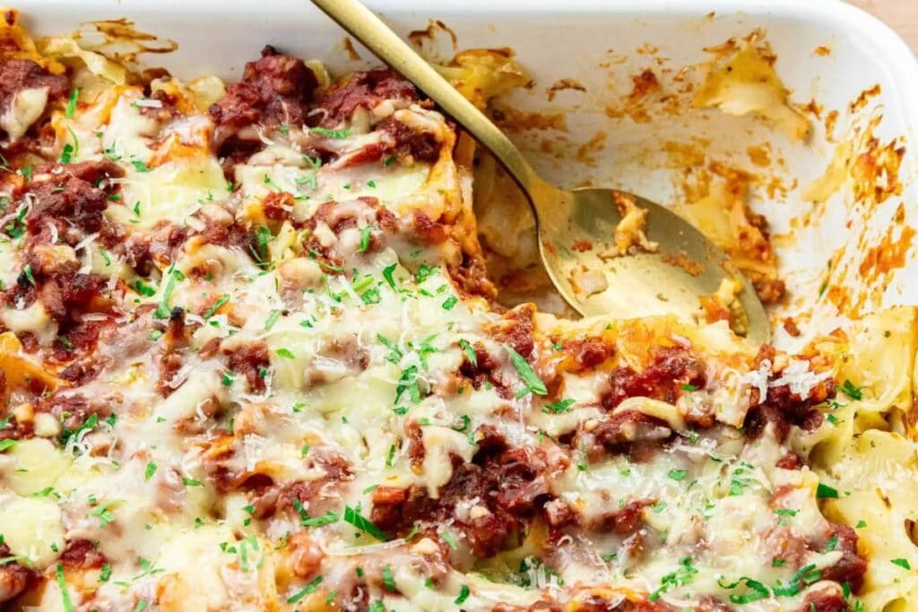 Beef and sour cream noodle casserole in a baking dish.