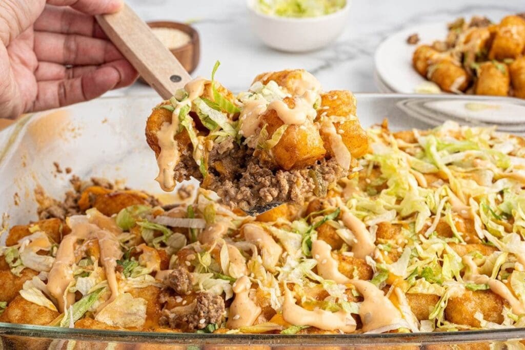 Close up of Big Mac tater tot casserole on a spoon.