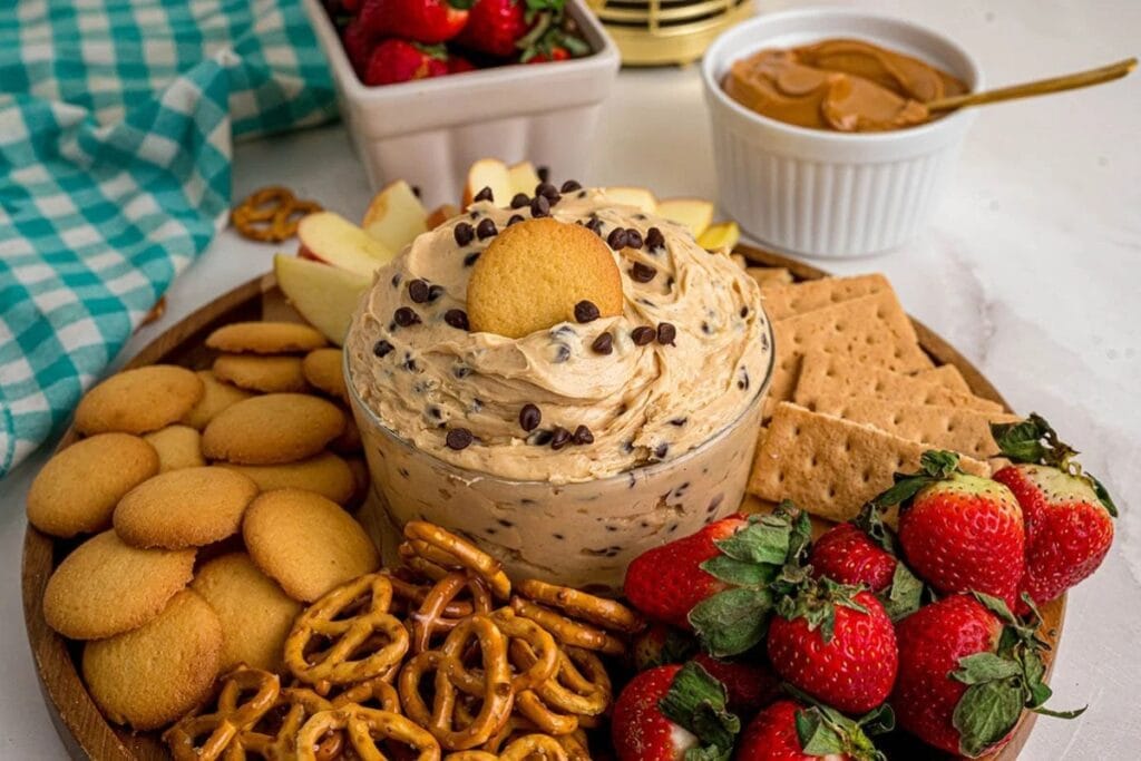 Chocolate chip cookie dip in a glass bowl.