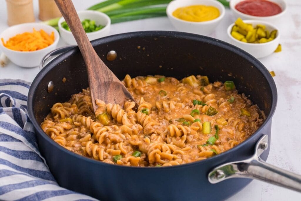 Cheeseburger pasta in a skillet.