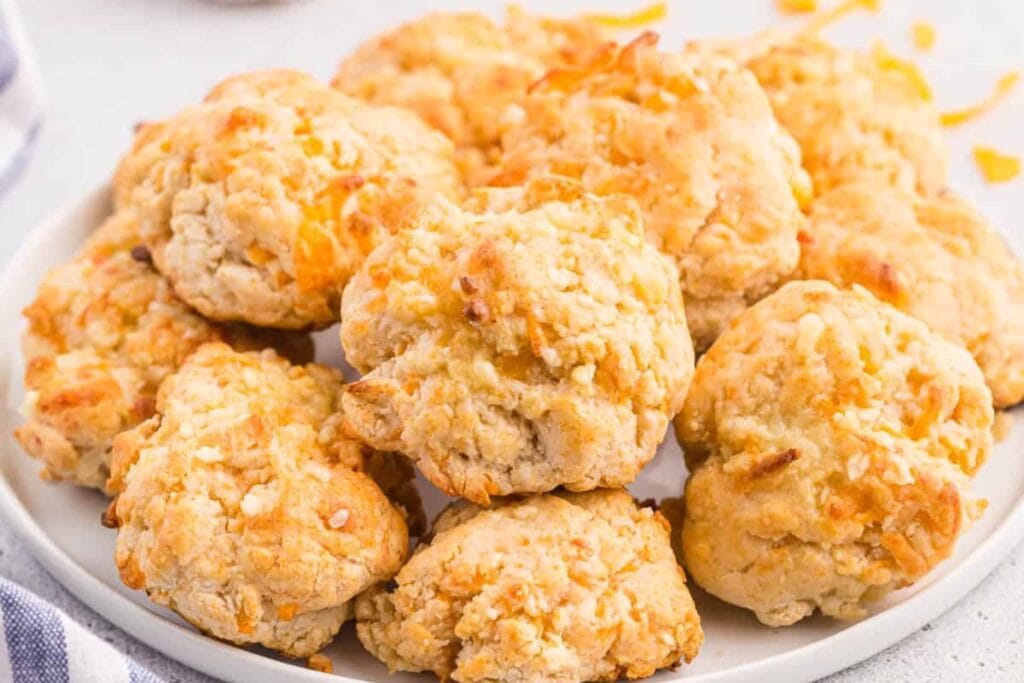 Cheesy garlic biscuits on a plate.