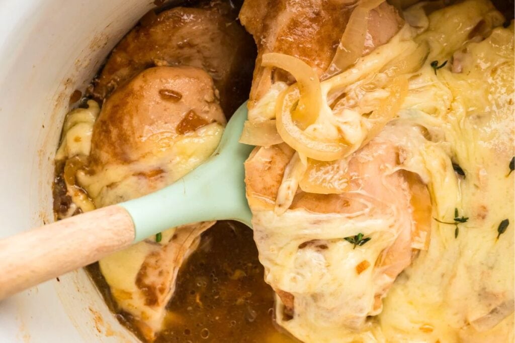 crockpot chicken with cheese being served