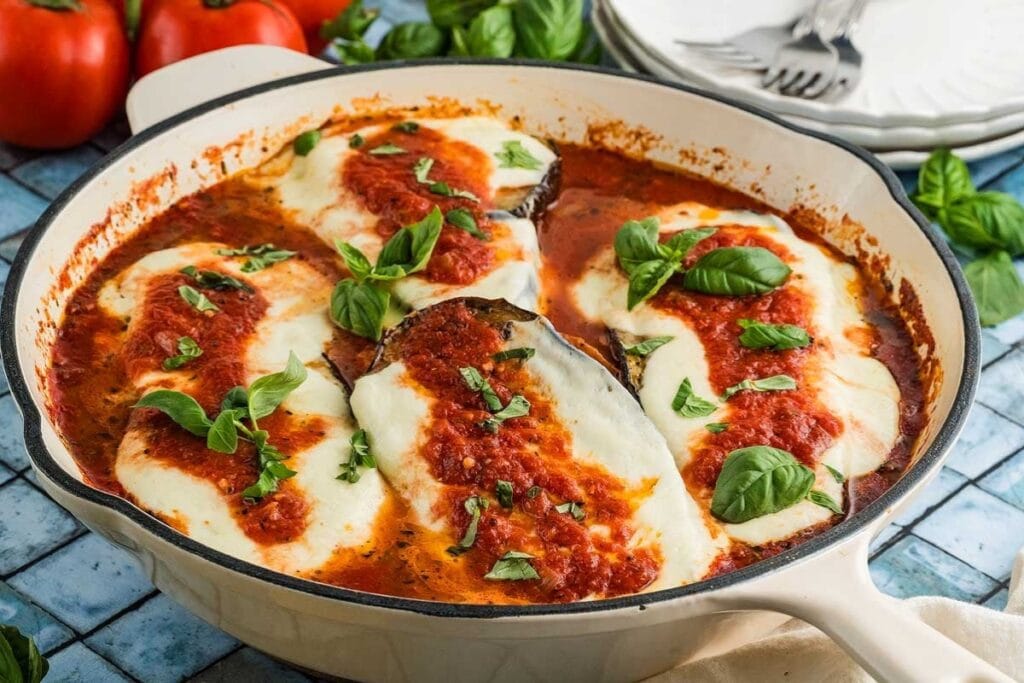 Chicken Sorrentino in a skillet.