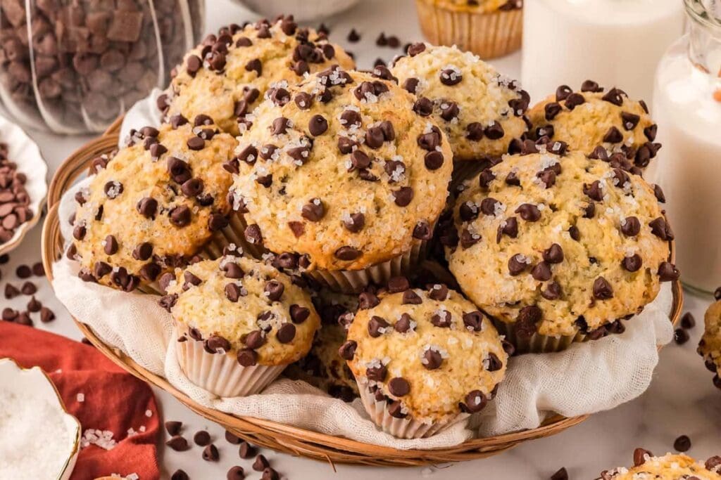 Chocolate chip muffins in a basket.