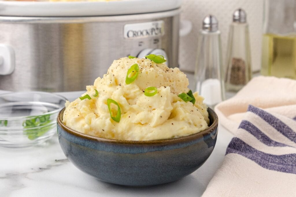 Crockpot make-ahead mashed potatoes in a bowl.