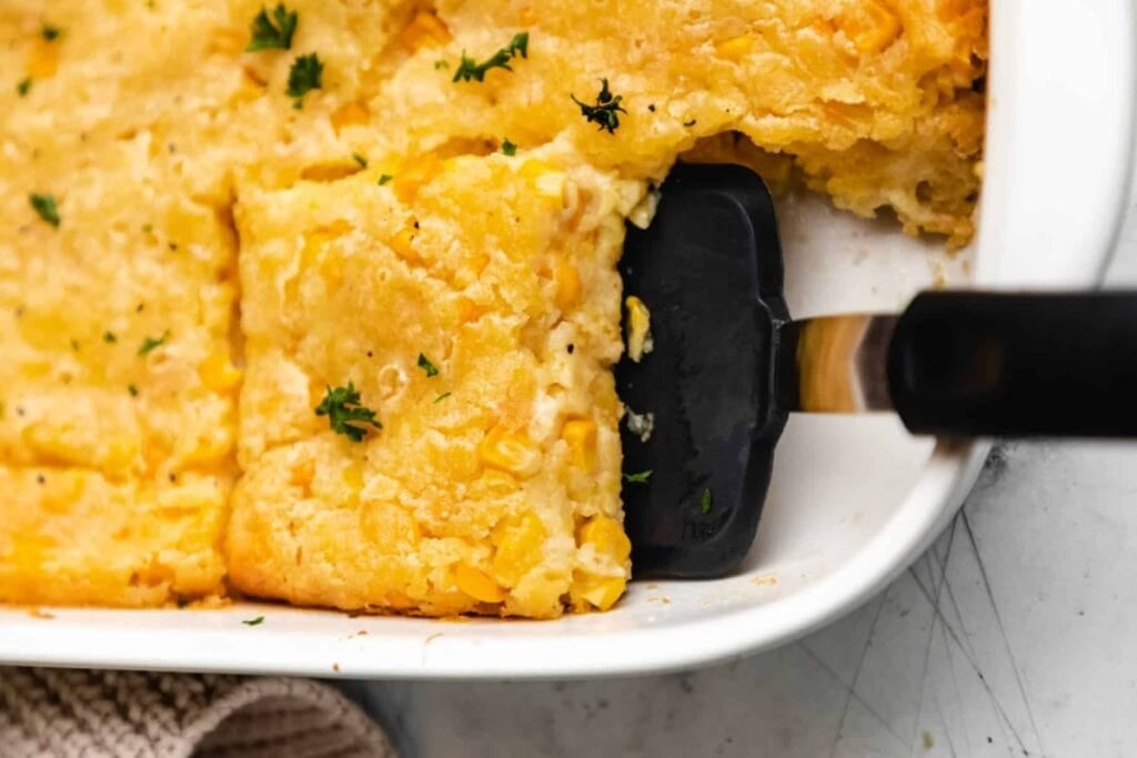 Jiffy corn casserole in a baking dish.