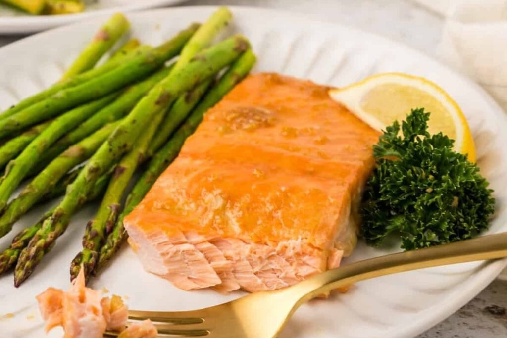 Maple glazed salmon on a plate.