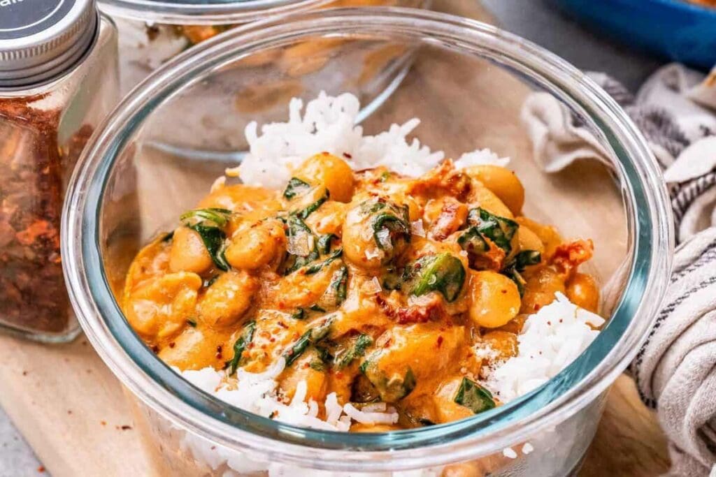 Marry Me butter beans with rice in a glass bowl.