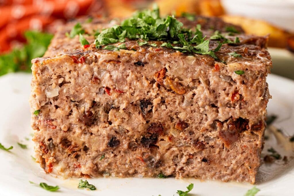 Mediterranean meatloaf on a plate.