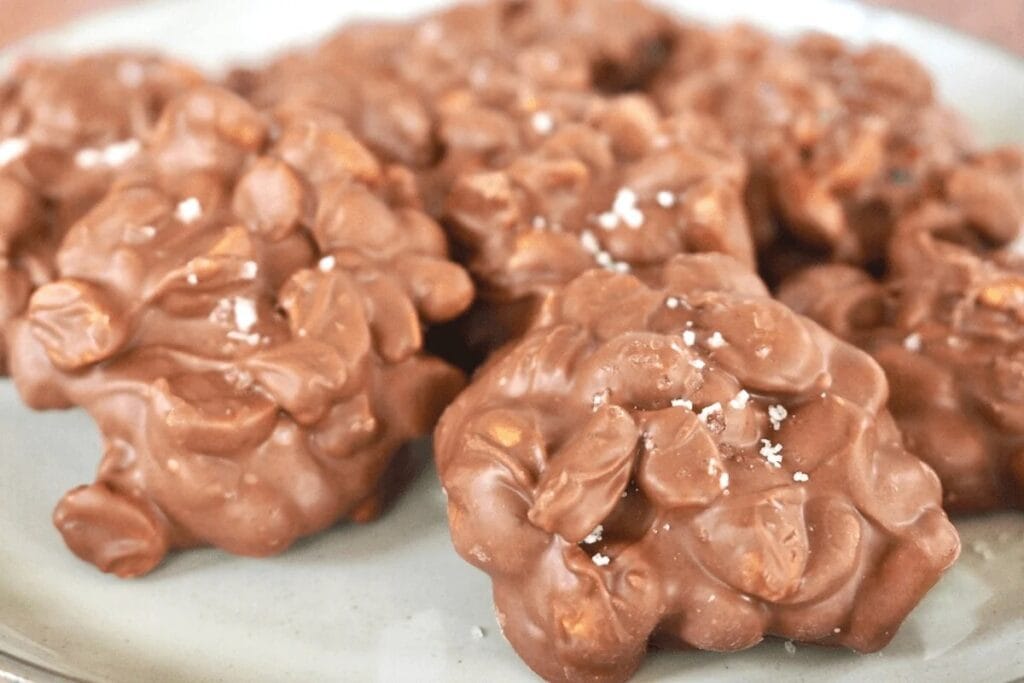 Peanut clusters on a plate.
