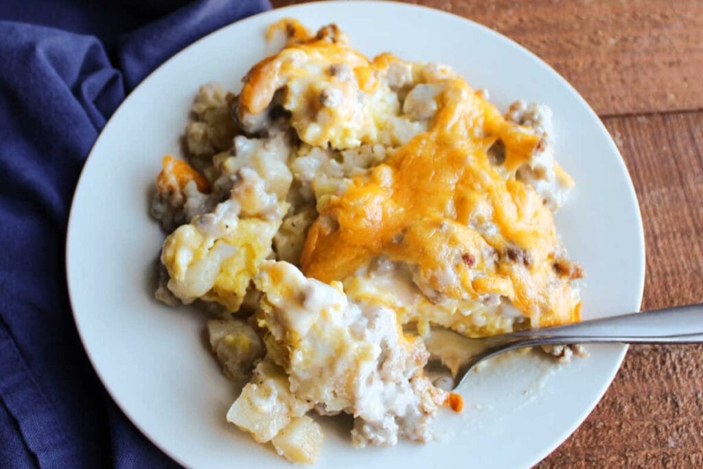 Sausage gravy breakfast casserole on a plate.
