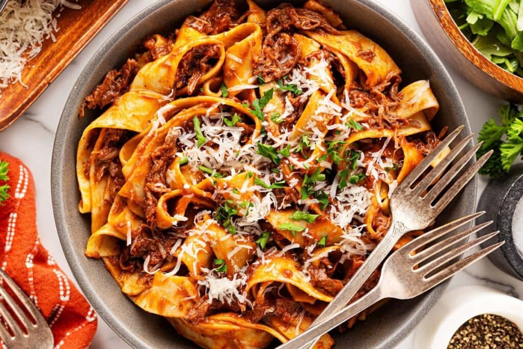 Short rib beef ragu in a bowl.
