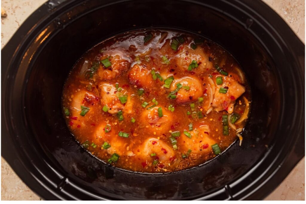 Apricot chicken in a crockpot.