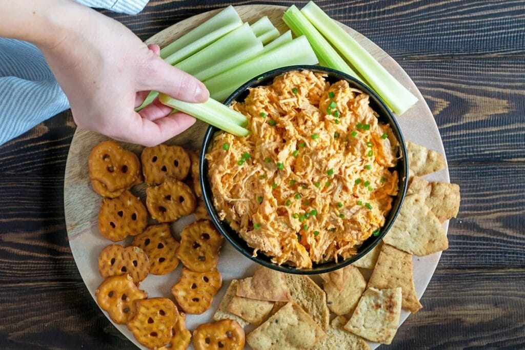Slow cooker buffalo chicken dip in a bowl.