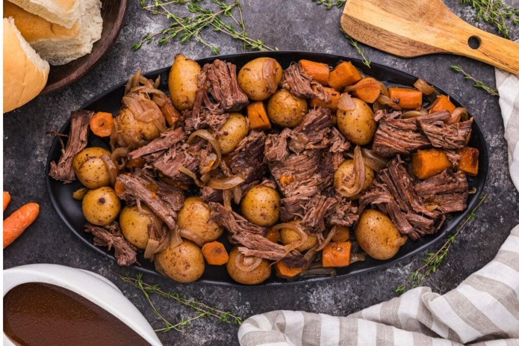 Slow cooker pot roast with potatoes and carrots.