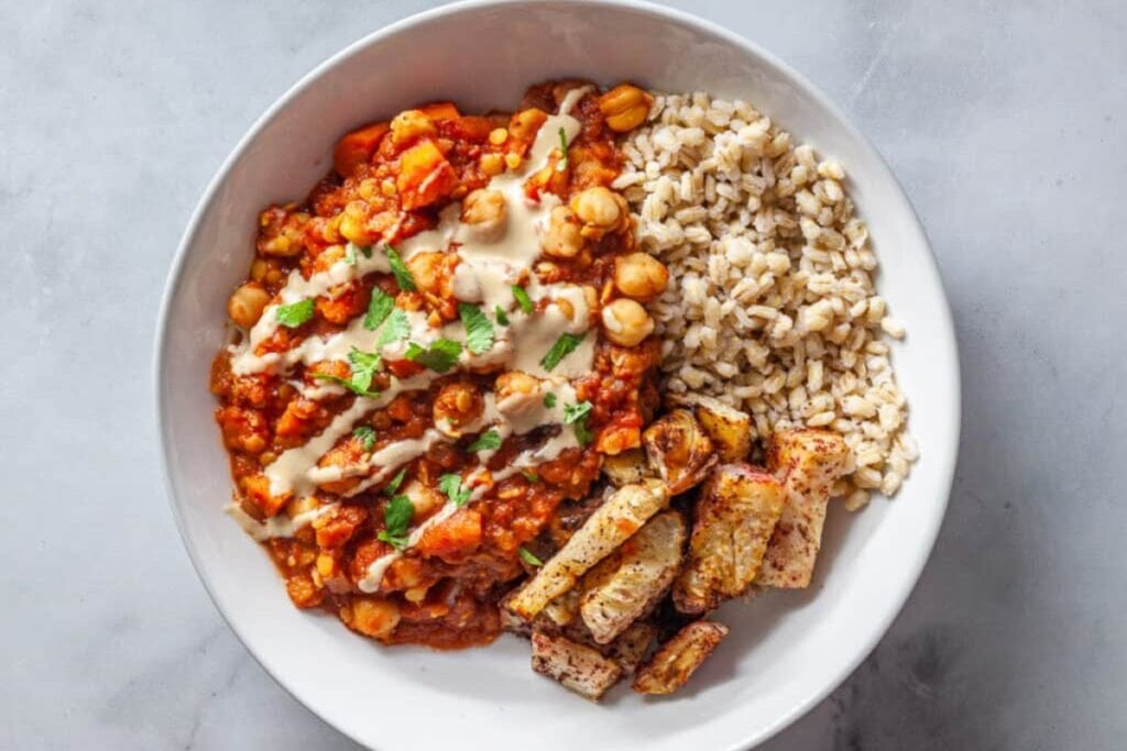 Stewed lentils and chickpeas in a bowl.