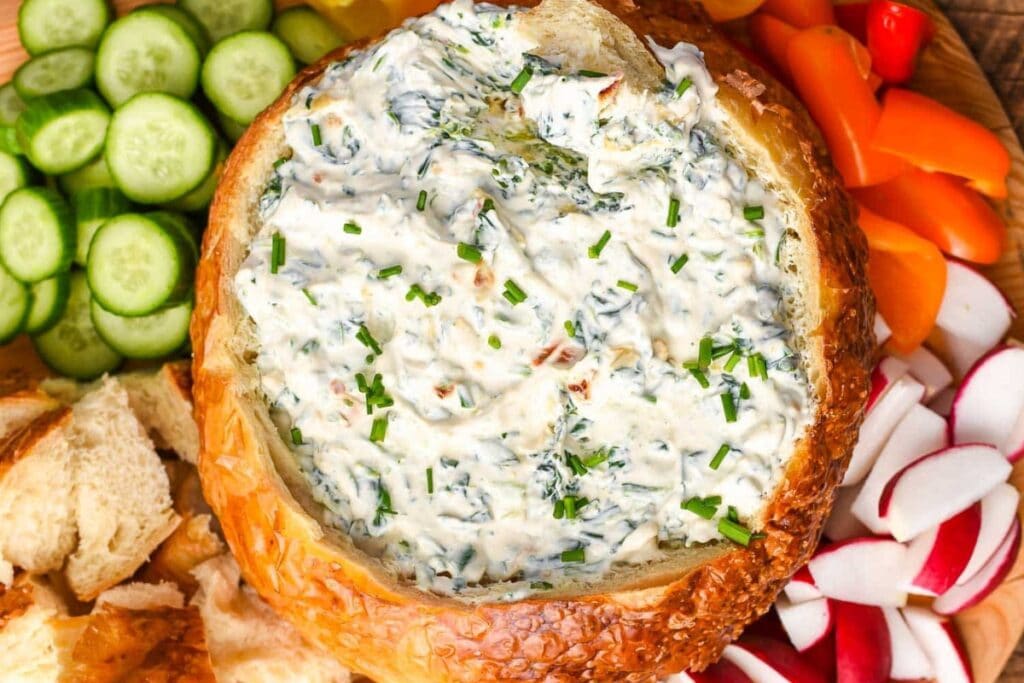 Spinach dip in a bread bowl.
