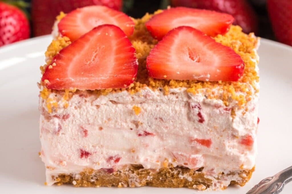 Strawberry Dream Dessert cake slice on a plate.