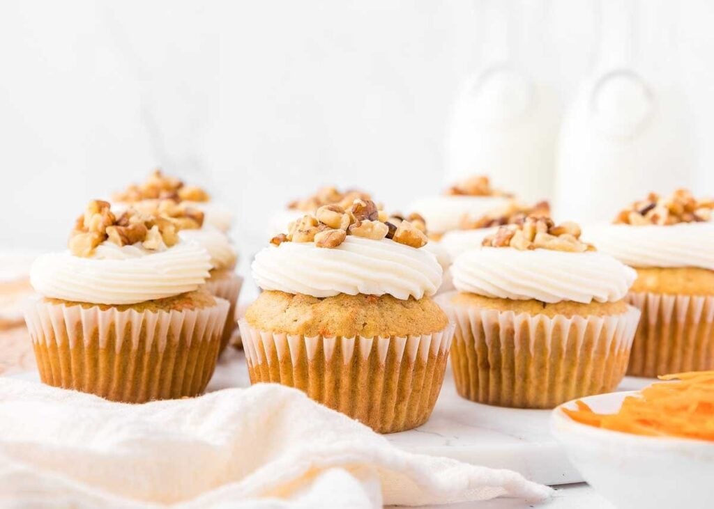 A close up shot of carrot cake cupcakes.