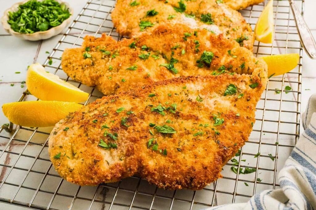 A close up shot of chicken cutlets.