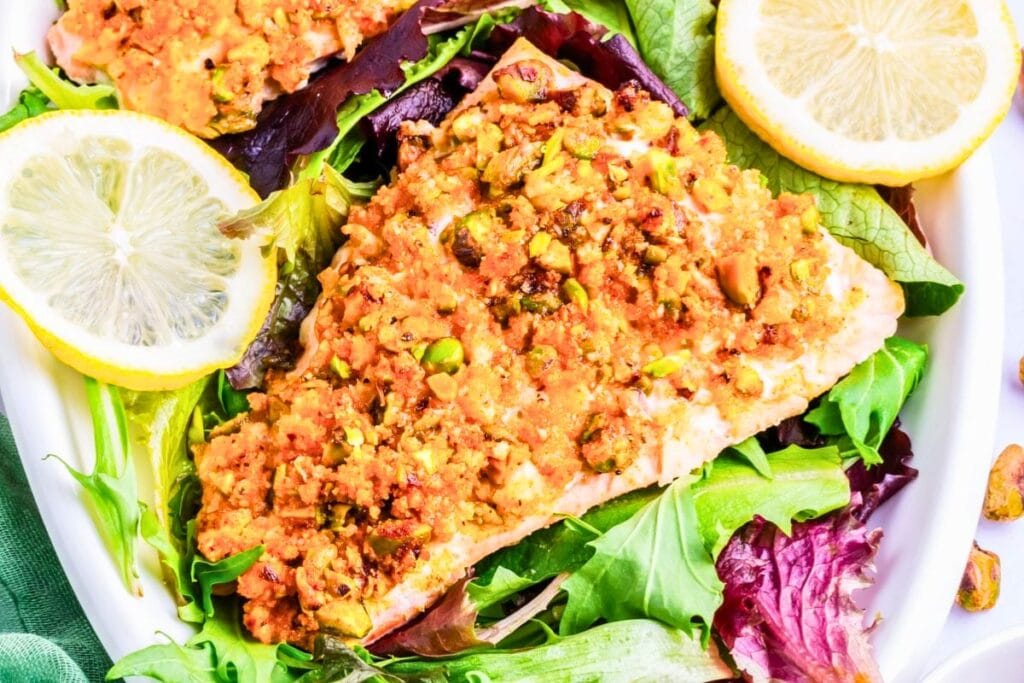 A close up shot of crusted pistachio salmon.