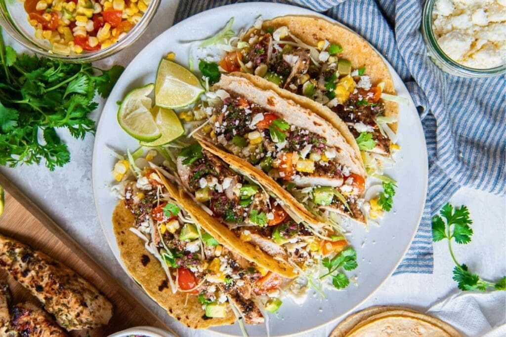 A close up shot of chicken tacos.