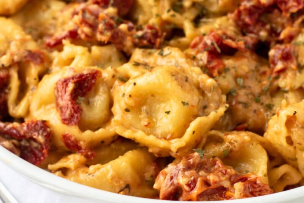 A close up shot of tortellini.