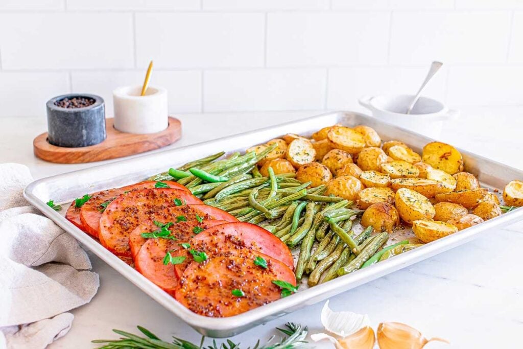 A close up shot of sheet pan ham dinner.