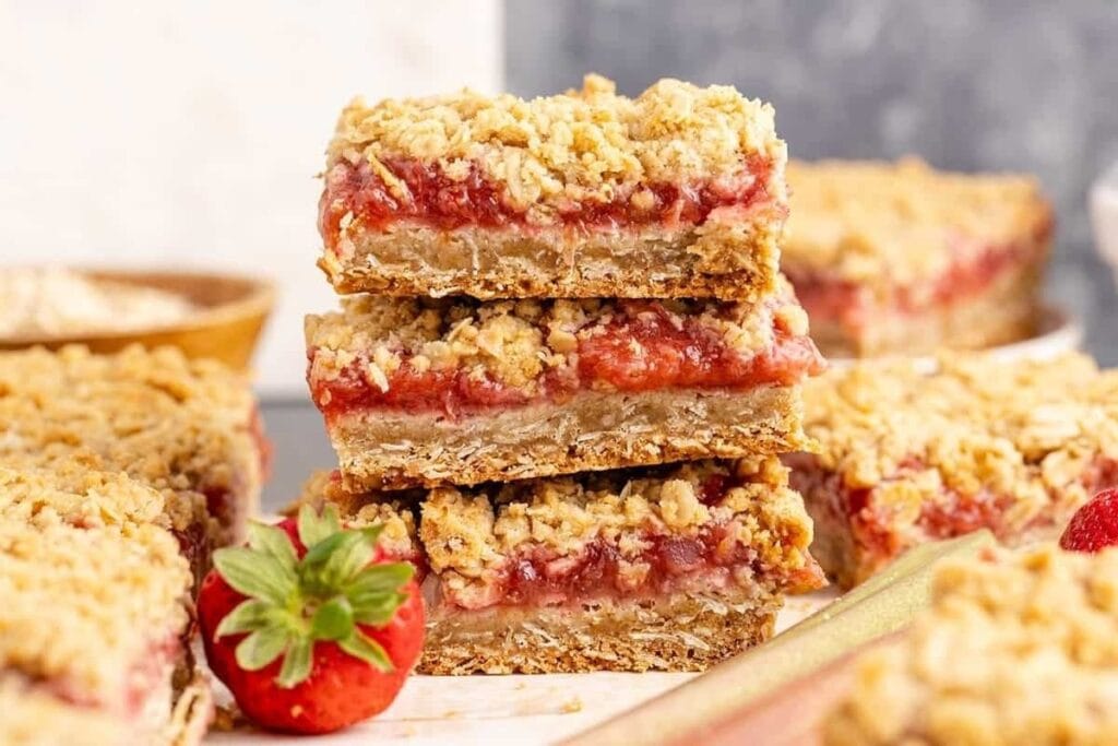 A close up shot of strawberry rhubarb bars.