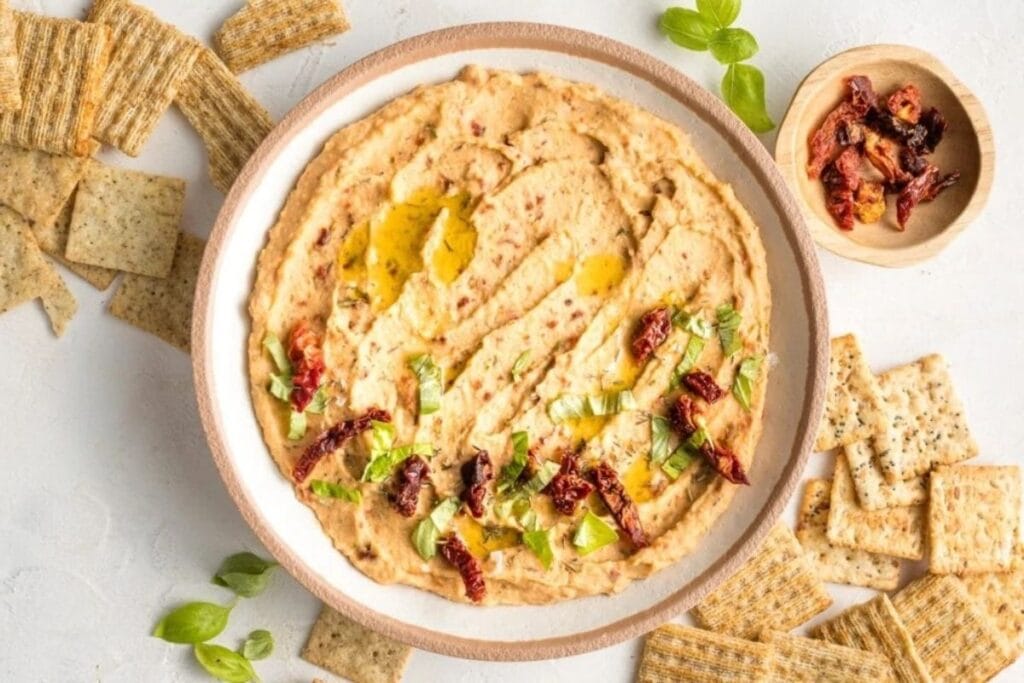 A close up shot of sun-dried tomato dip.
