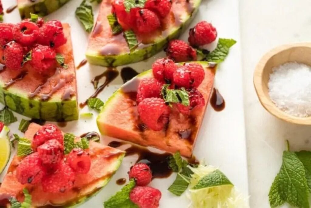 A close up shot of watermelon raspberry mint wedges.