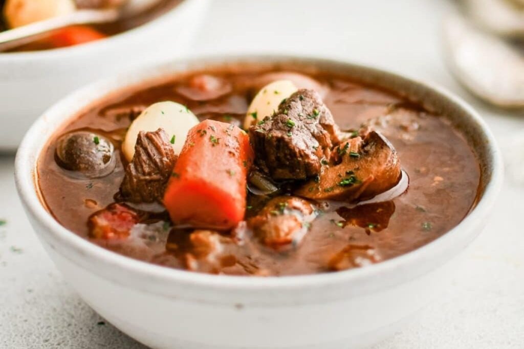 Beef bourguignon in a bowl.