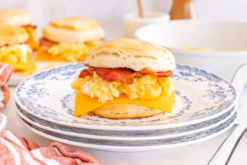 Biscuit breakfast sandwiches served on a plate.