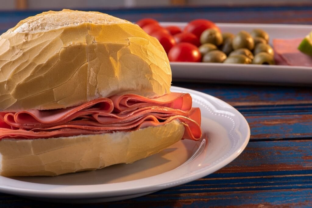 Bologna sandwich on a plate.