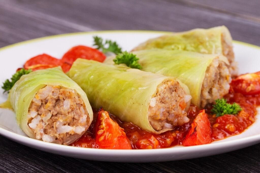 Cabbage rolls on a plate.